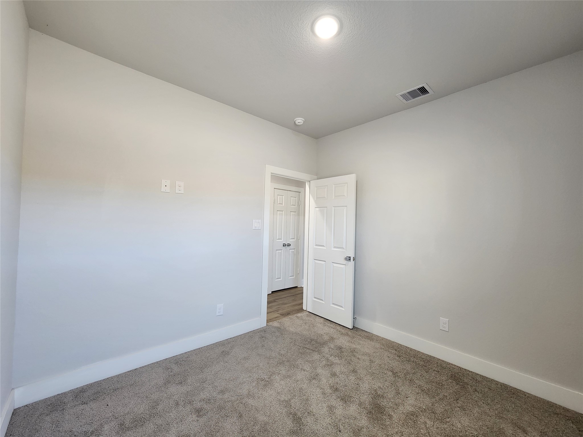 9710 Tuffly Street, Unit B Houston, TX 77029 - Photo 13 of 14 a view of an empty room