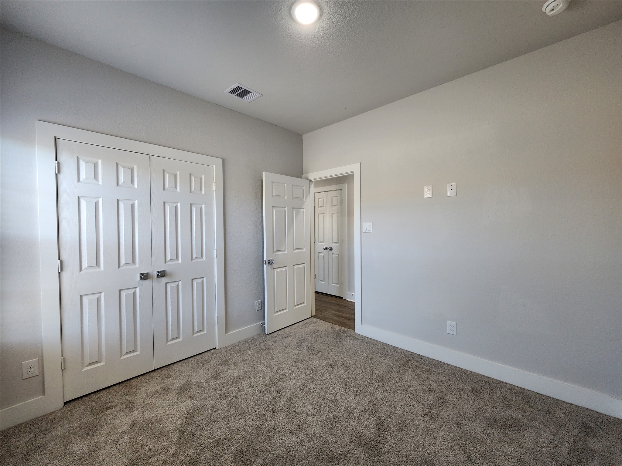 9710 Tuffly Street, Unit B Houston, TX 77029 - Photo 10 of 14 a view of an empty room and closet area