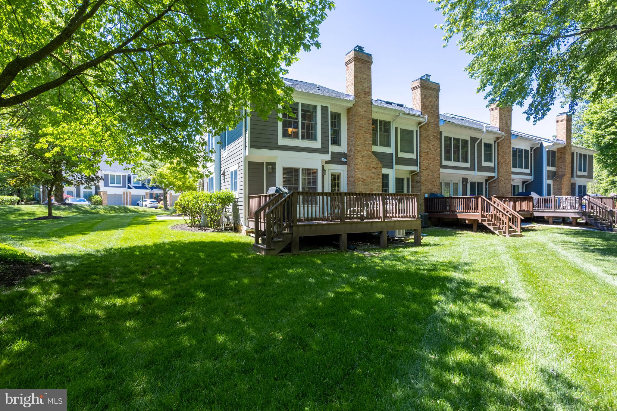 63 Raisin Tree Circle Baltimore, MD 21208 - Photo 57 of 57 a view of a house with a yard deck and sitting area