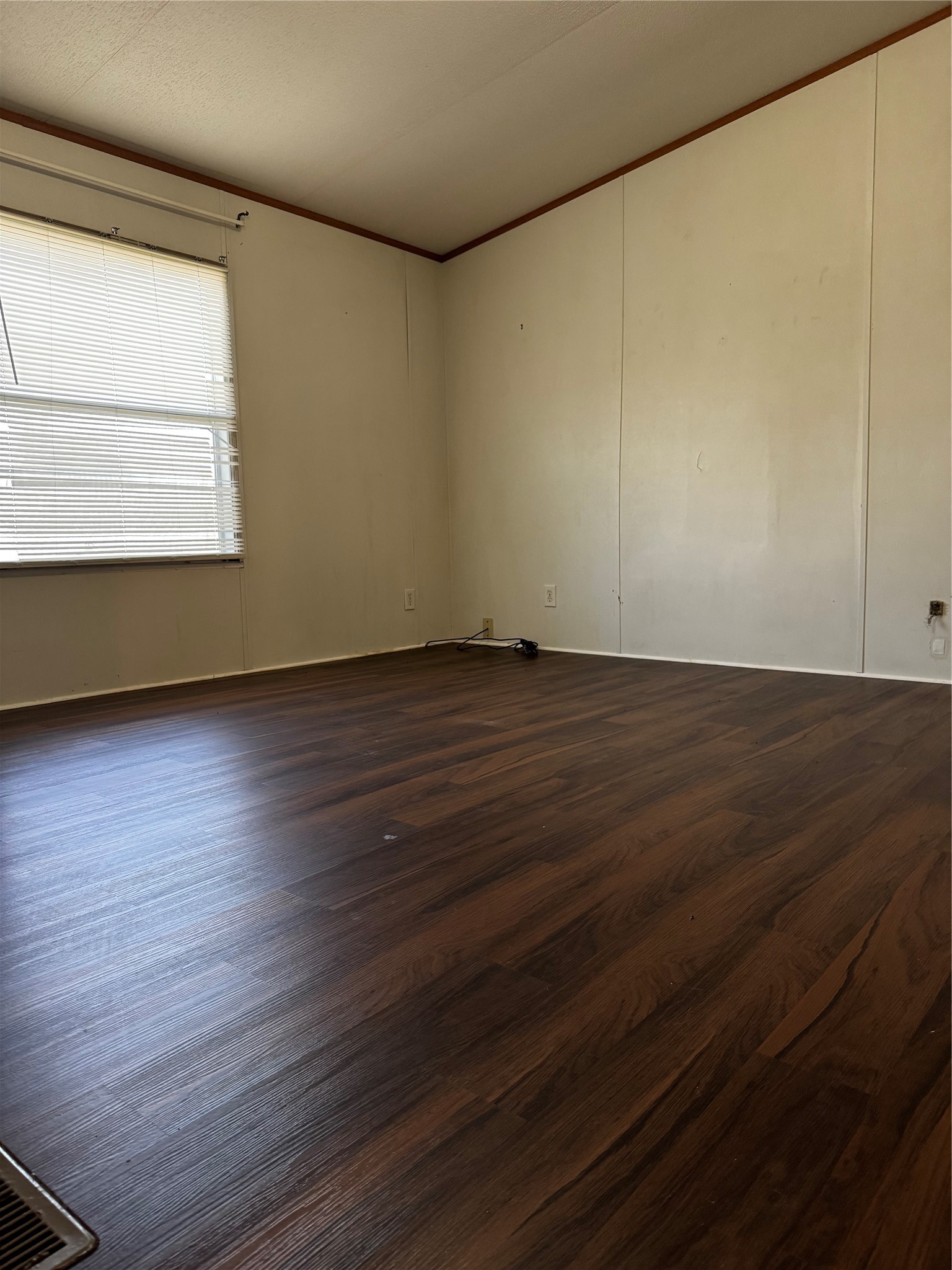 15930 Boss Gaston Road Sugar Land, TX 77498 - Photo 13 of 20 a view of an empty room with wooden floor and a window
