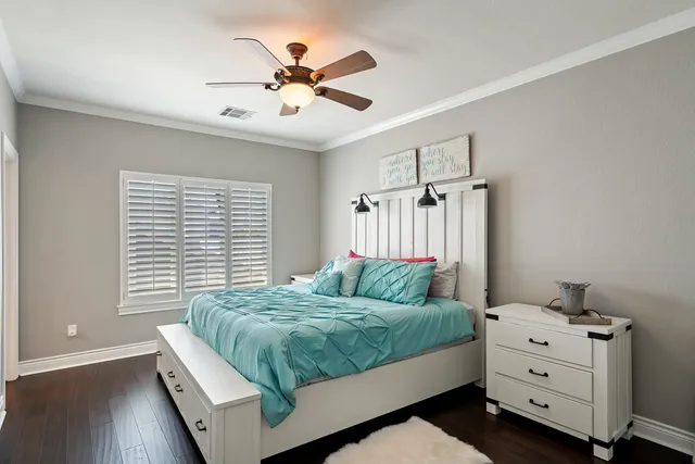 a building outdoor space with patio furniture and potted plants