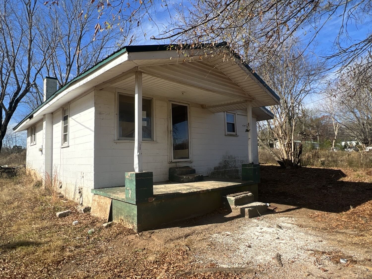 123 Snow Road Flintville, TN 37335 - Photo 3 of 17 a backyard of a house with table and chairs