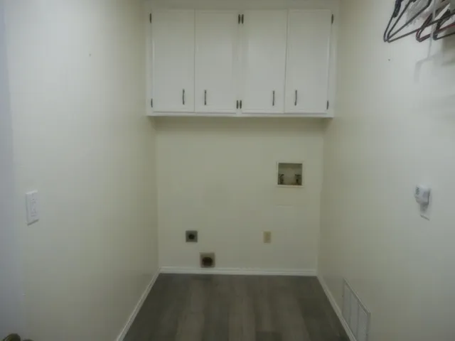 a view of a room with a fan