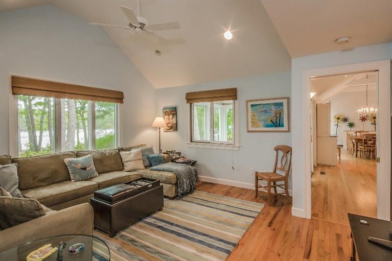 70 Fells Pond Road Mashpee, MA 02649 - Photo 13 of 34 a living room with furniture and a wooden floor