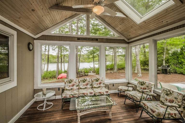 70 Fells Pond Road Mashpee, MA 02649 - Photo 16 of 34 a living room with furniture and large windows