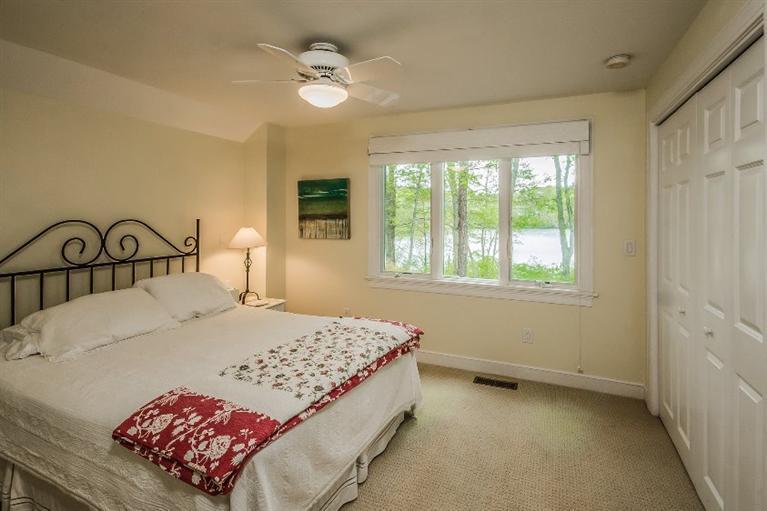 70 Fells Pond Road Mashpee, MA 02649 - Photo 22 of 34 a bedroom with a bed and a window