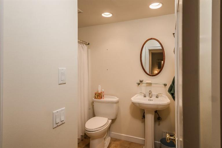 70 Fells Pond Road Mashpee, MA 02649 - Photo 26 of 34 a bathroom with a sink mirror and toilet