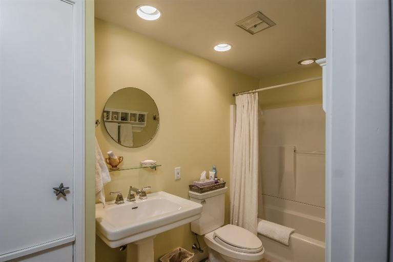70 Fells Pond Road Mashpee, MA 02649 - Photo 27 of 34 a bathroom with a sink a toilet and shower