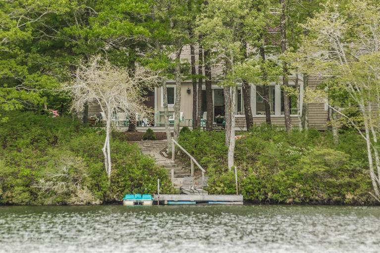 70 Fells Pond Road Mashpee, MA 02649 - Photo 33 of 34 a view of a house with a yard