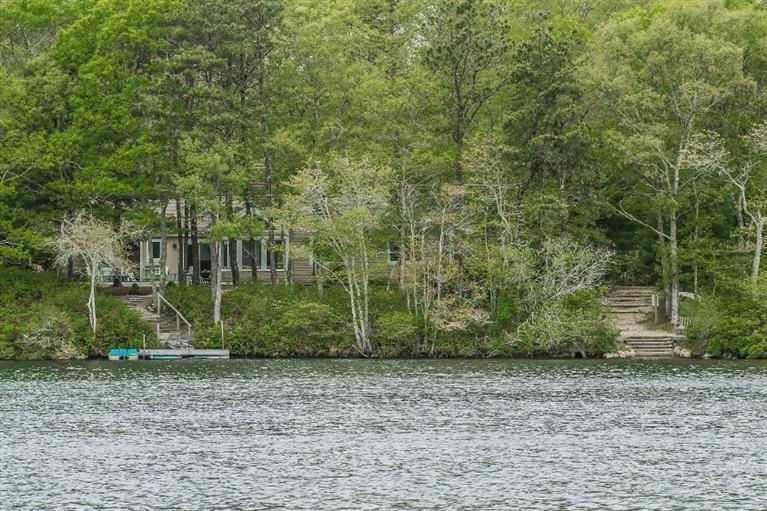 70 Fells Pond Road Mashpee, MA 02649 - Photo 4 of 34 a view of a backyard