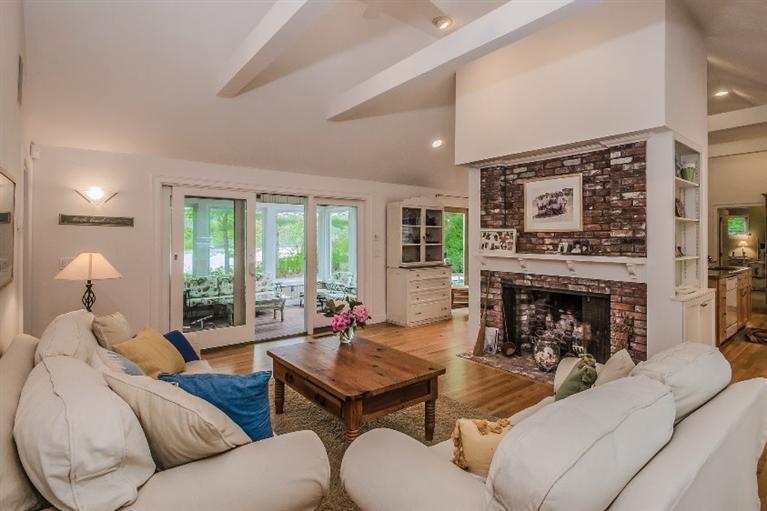 70 Fells Pond Road Mashpee, MA 02649 - Photo 6 of 34 a living room with furniture fireplace and window