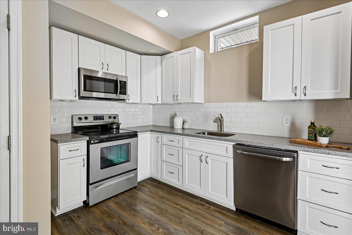 603 Queenstown Road Severn, MD 21144 - Photo 57 of 85 Modern kitchen with sleek finishes.