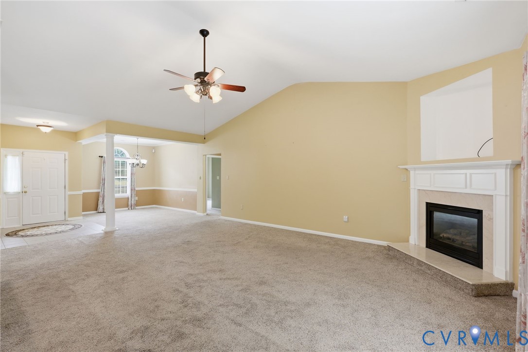 14719 Clover Ridge Lane Chesterfield, VA 23832 - Photo 8 of 36 Spacious open-concept living area featuring a vaul