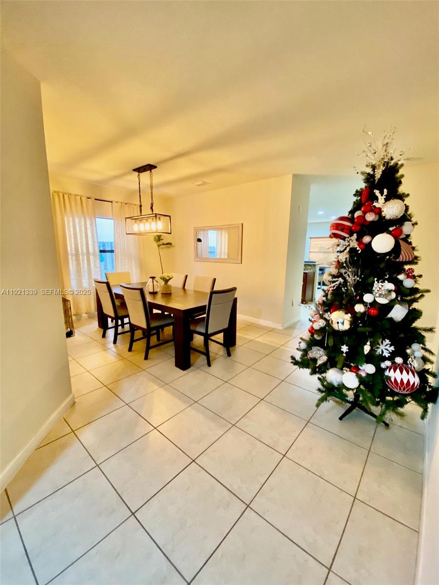 4318 Southwest 164th Court Miami, FL 33185 - Photo 14 of 27 a outdoor space with lots of flowers