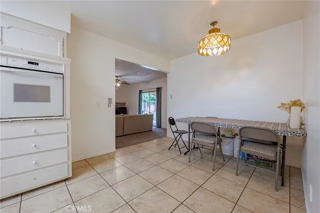 a view of a workspace and a window in a room
