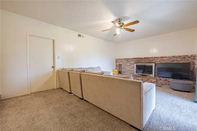 a view of a livingroom with furniture