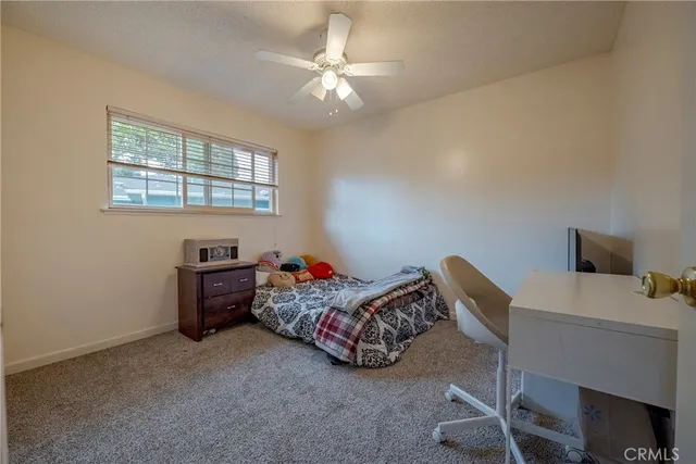 a room with furniture and a window