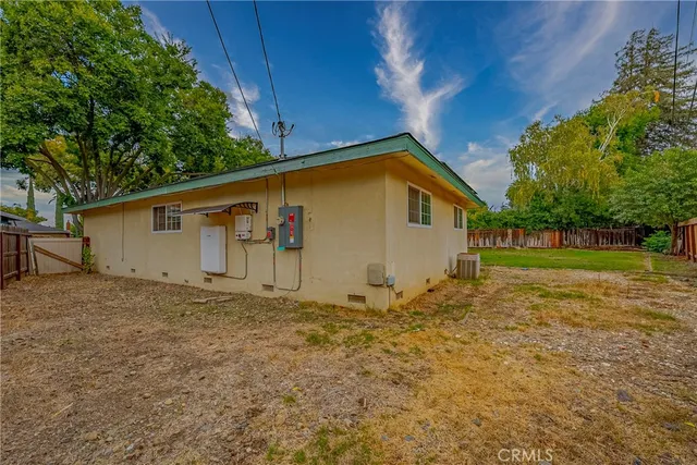 a house with trees in front of it