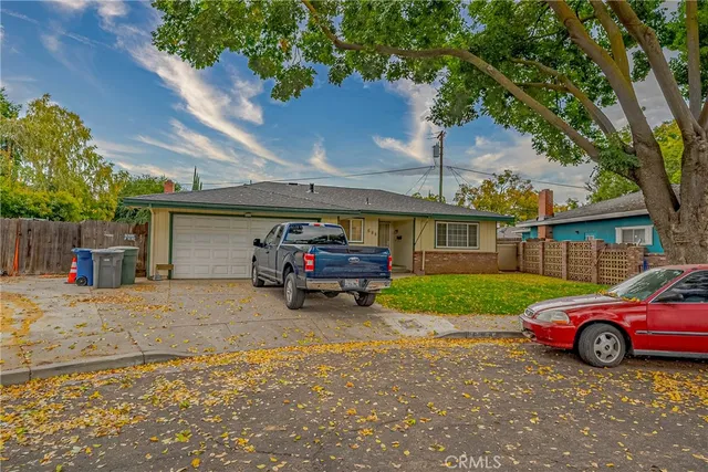 a view of a car parked in front of a house