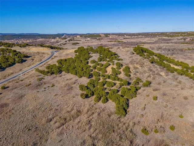 a view of a yard with an empty space and a yard
