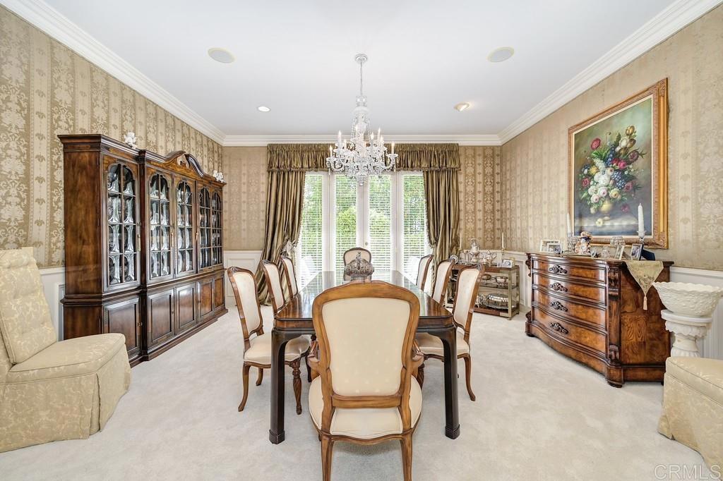 7210 Aviara Drive Carlsbad, CA 92011 - Photo 30 of 63 a view of a dining room with furniture window and outside view