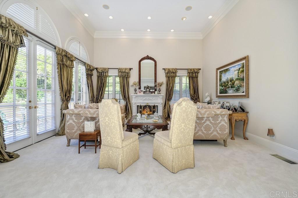 7210 Aviara Drive Carlsbad, CA 92011 - Photo 31 of 63 a living room with furniture and a large window
