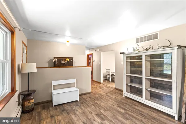 a kitchen with stainless steel appliances granite countertop a stove refrigerator sink and cabinets