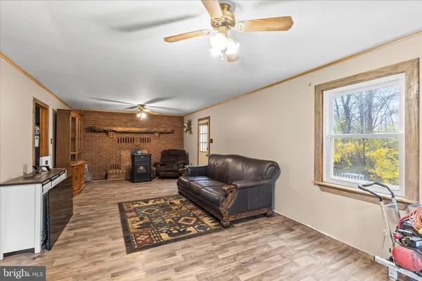 a bathroom with a sink a mirror and a shower