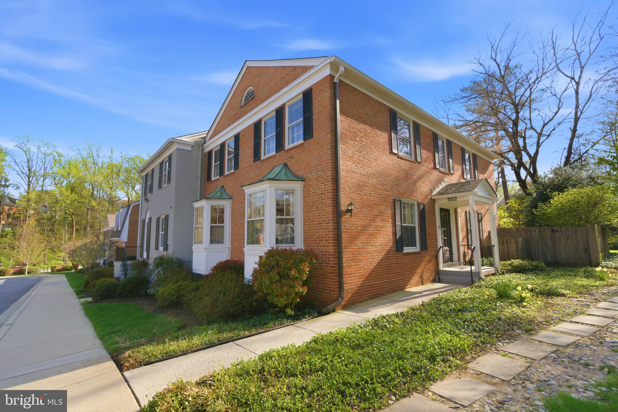 3512 Hamlet Place Chevy Chase, MD 20815 - Photo 1 of 51 a front view of a house with a yard