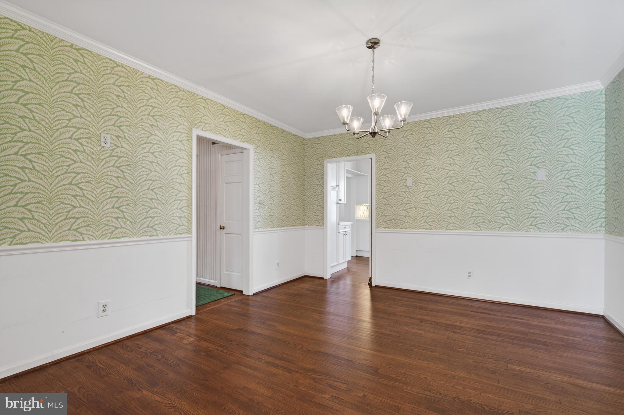 3512 Hamlet Place Chevy Chase, MD 20815 - Photo 13 of 51 a view of an empty room with wooden floor