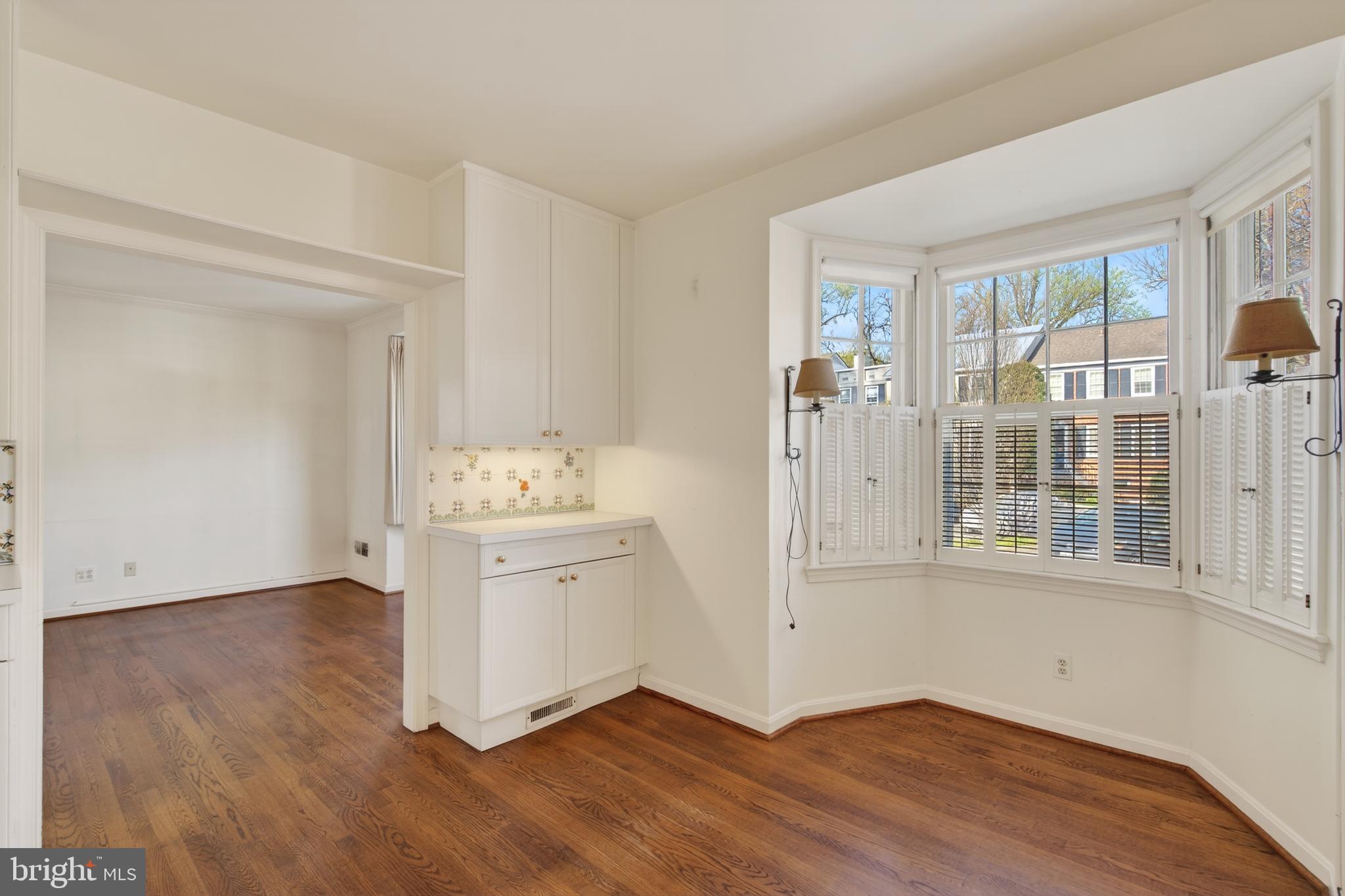 3512 Hamlet Place Chevy Chase, MD 20815 - Photo 18 of 51 wooden floor in an empty room with a window