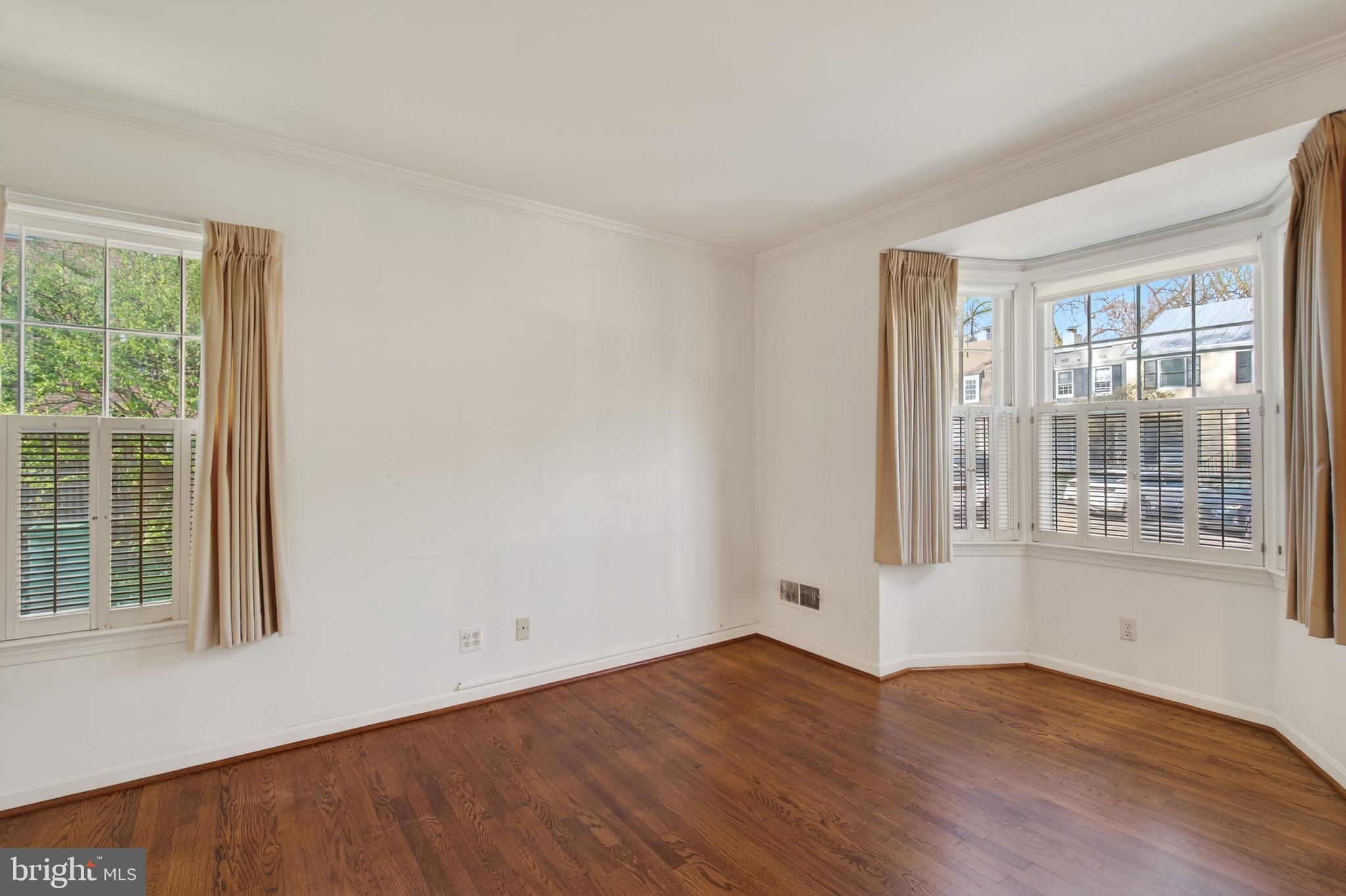 3512 Hamlet Place Chevy Chase, MD 20815 - Photo 23 of 51 a view of wooden floor and windows in a room