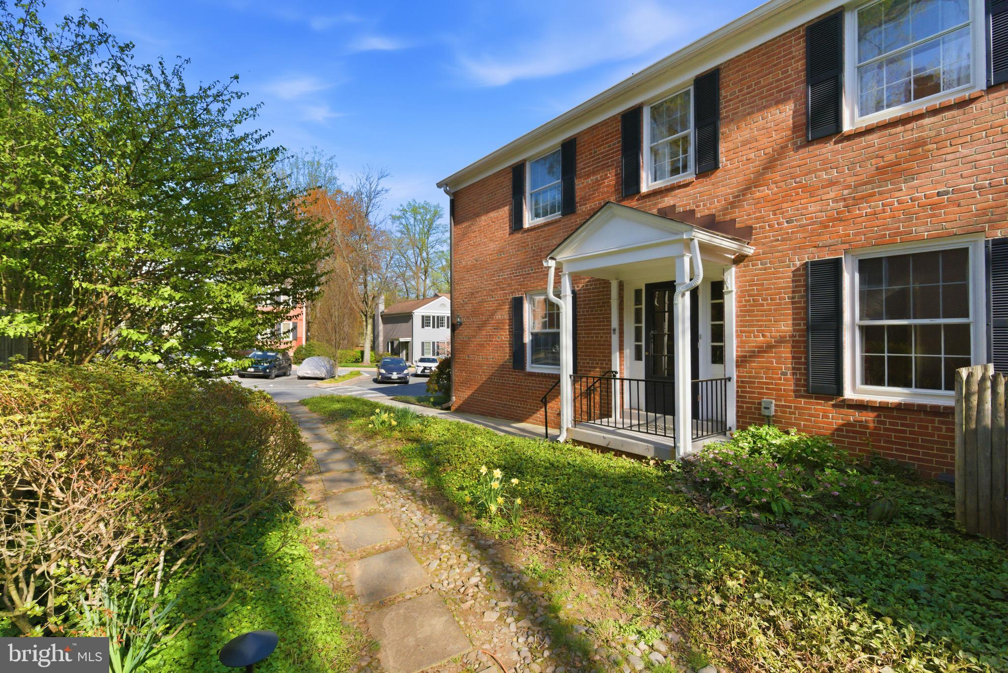 3512 Hamlet Place Chevy Chase, MD 20815 - Photo 3 of 51 a front view of a house with a yard
