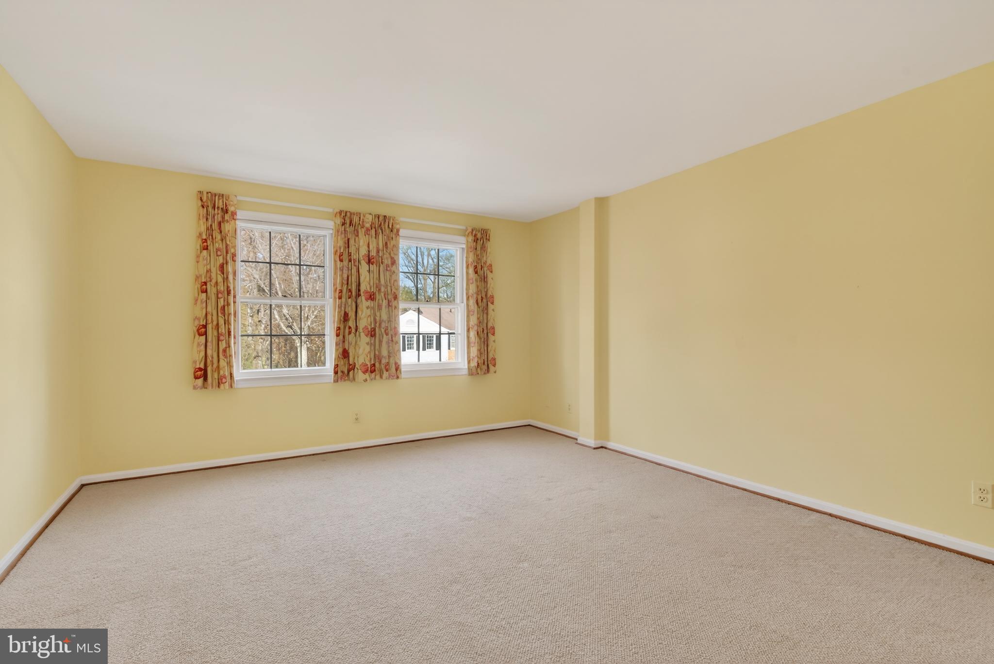 3512 Hamlet Place Chevy Chase, MD 20815 - Photo 31 of 51 an empty room with windows