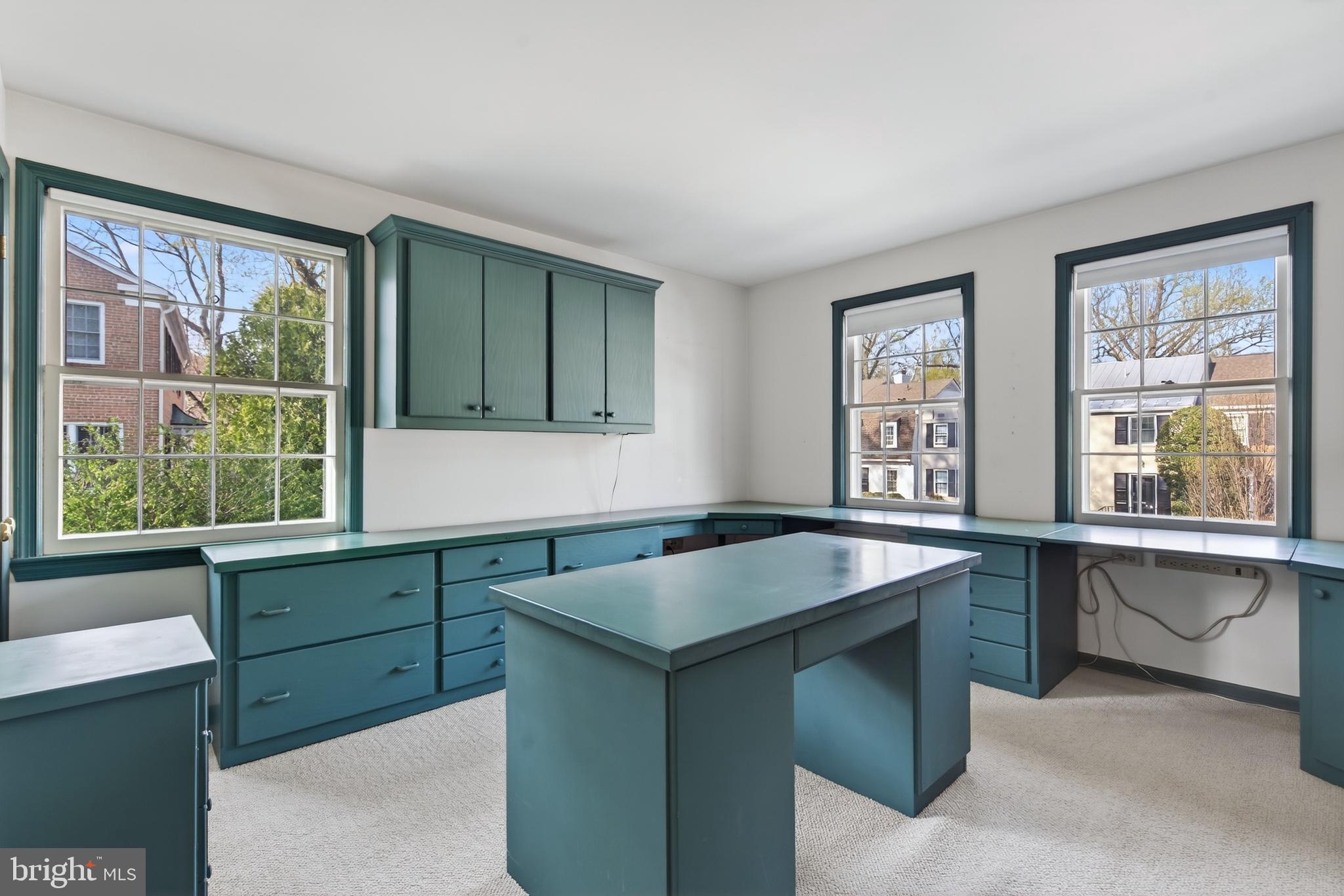 3512 Hamlet Place Chevy Chase, MD 20815 - Photo 36 of 51 a kitchen with a stove a sink and a window