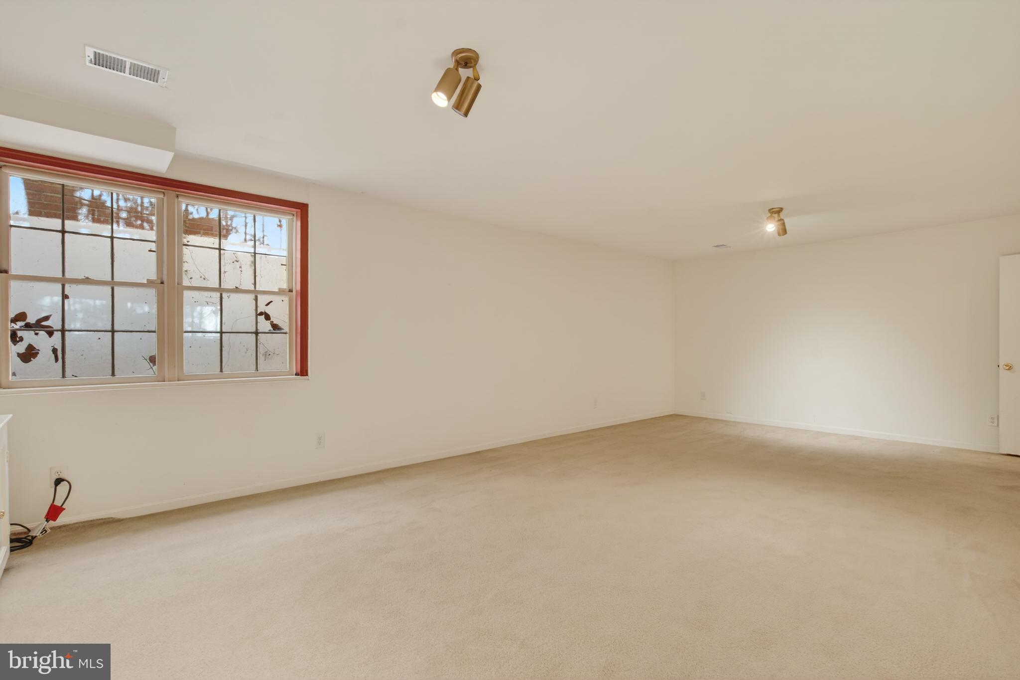 3512 Hamlet Place Chevy Chase, MD 20815 - Photo 44 of 51 a view of an empty room with a window