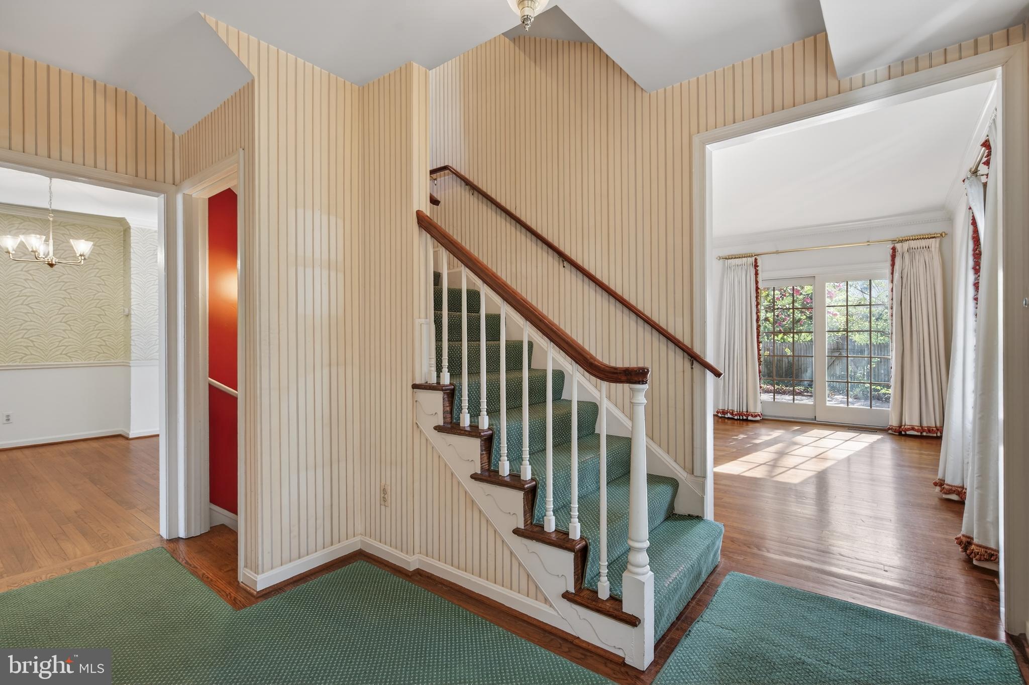 3512 Hamlet Place Chevy Chase, MD 20815 - Photo 8 of 51 a view of entryway with wooden floor and stairs