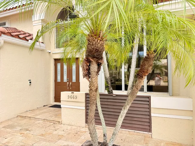 a view of a brick building with many windows