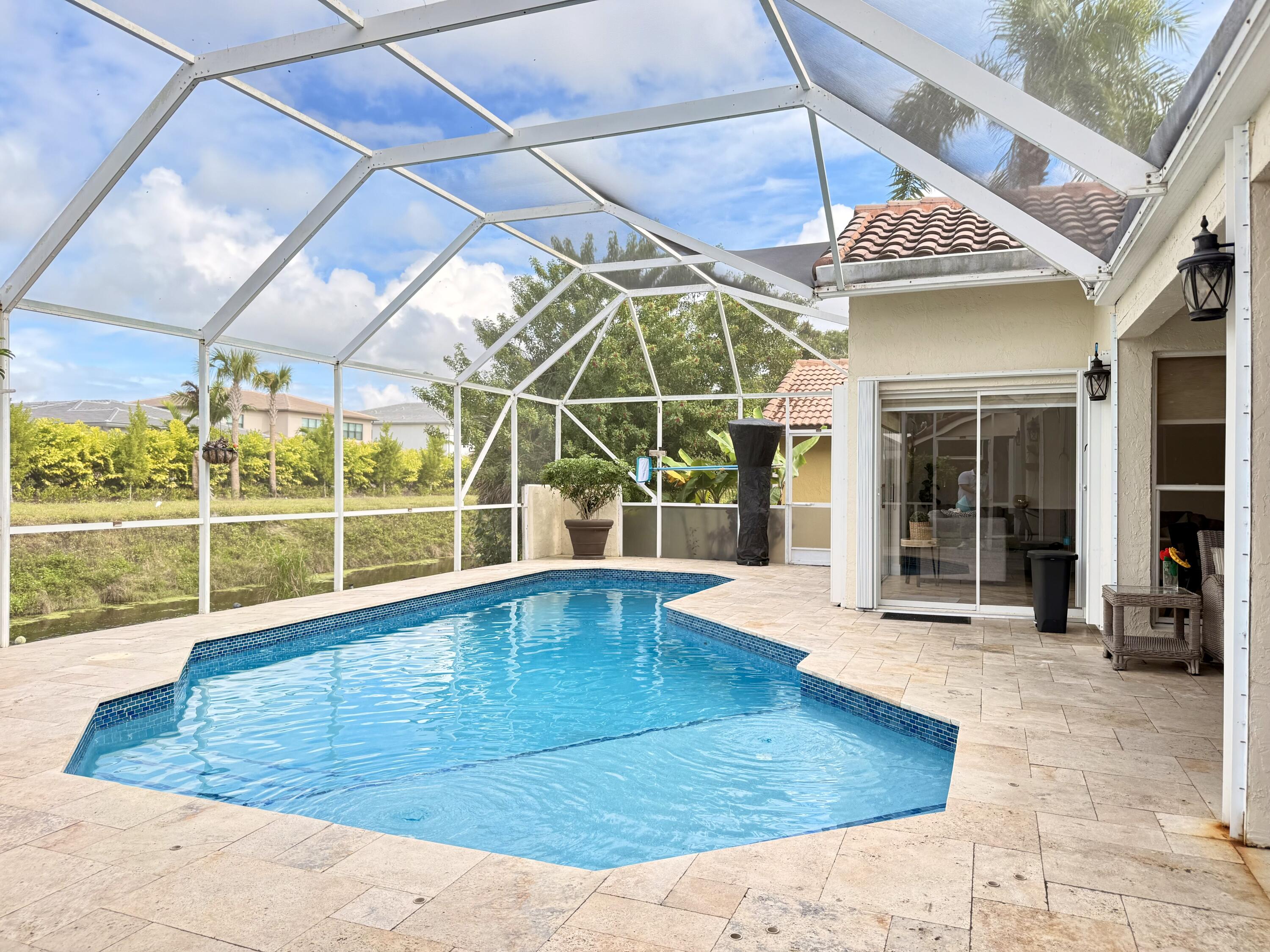 9669 Carousel Circle North Boca Raton, FL 33434 - Photo 8 of 22 a view of a indoor swimming pool