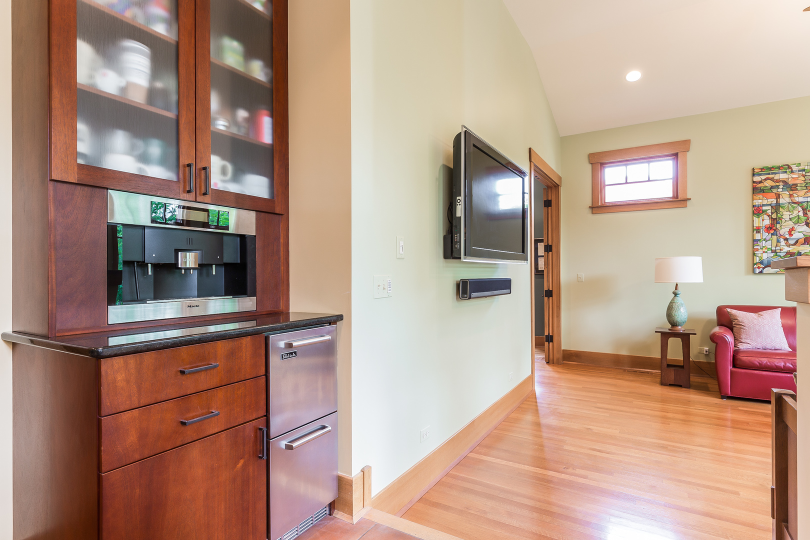 333 Longcommon Road Riverside, IL 60546 - Photo 14 of 50 a view of a livingroom with wooden floor and furniture