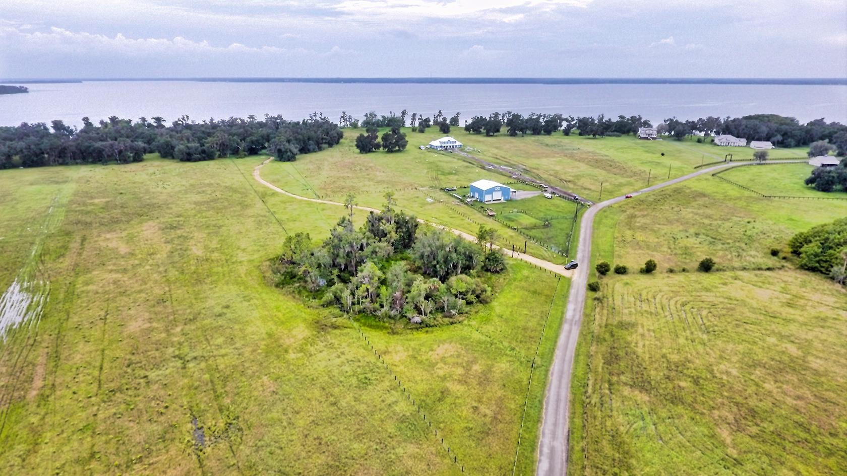 14435 Andalusia Trail Bunnell, FL 32110 - Photo 19 of 25 a view of a lake with a mountain
