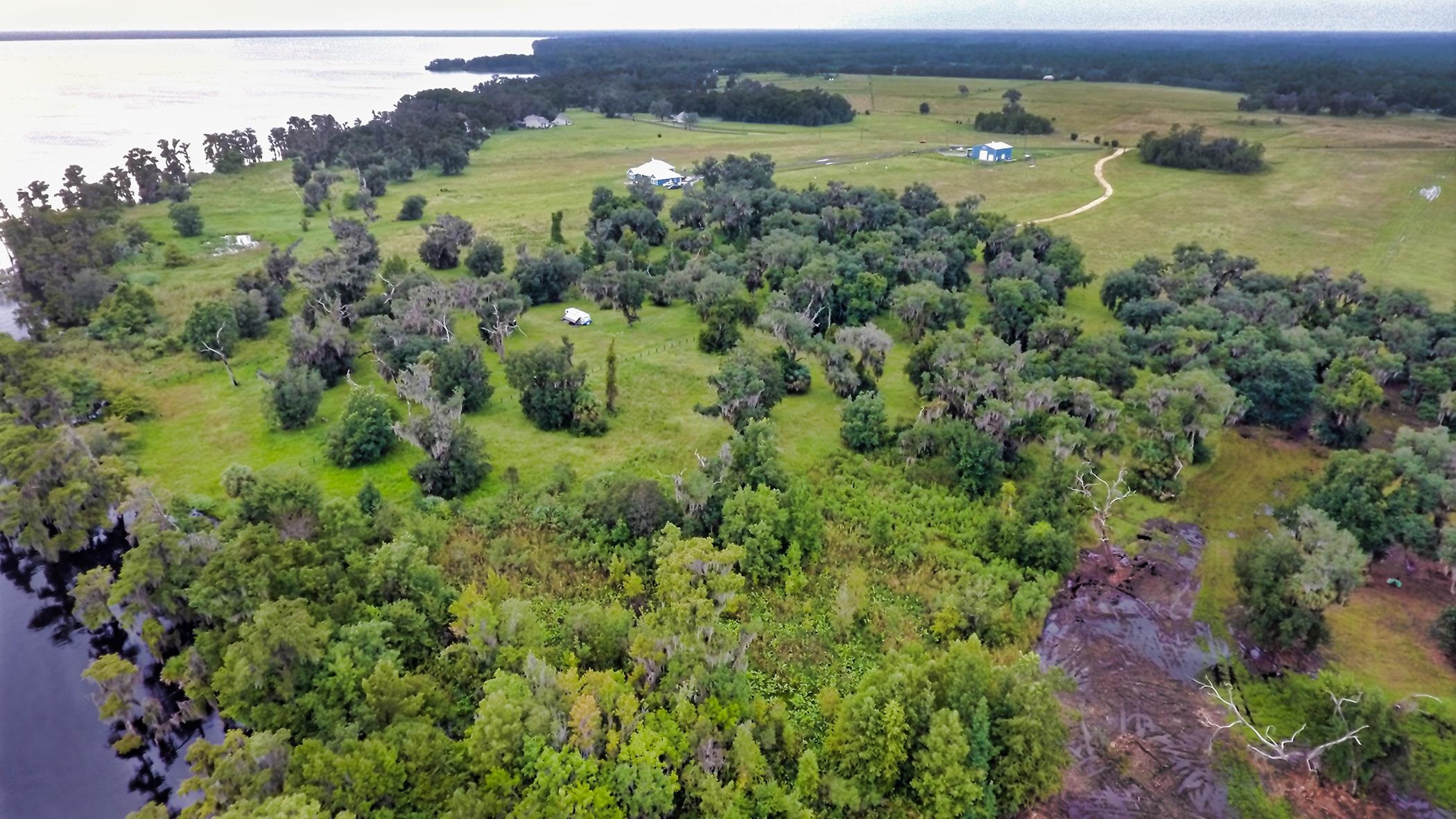 14435 Andalusia Trail Bunnell, FL 32110 - Photo 20 of 25 an aerial view of a houses with a yard
