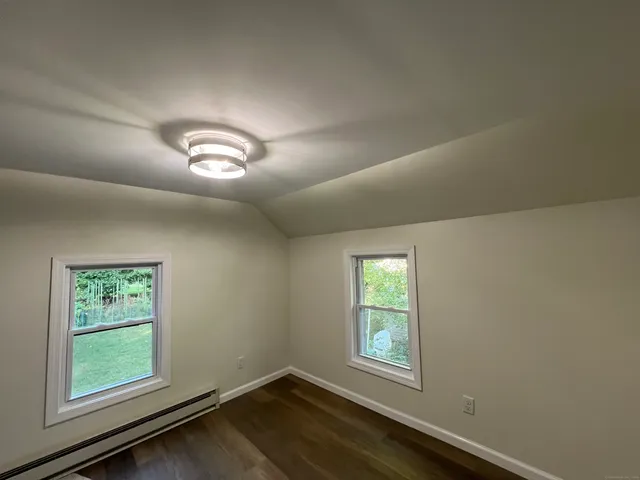 an empty room with windows