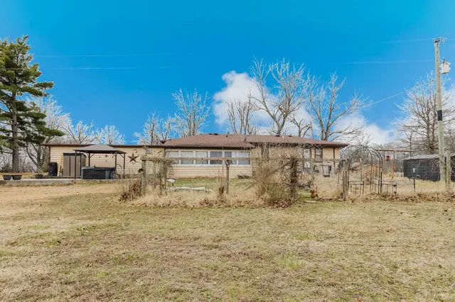 a view of a house with a snow