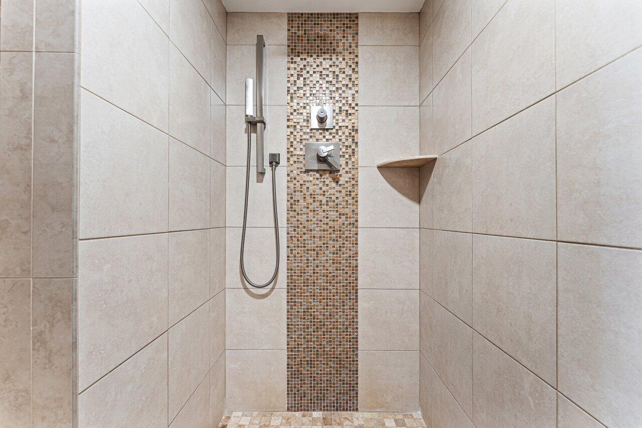 2003 North Ocean Boulevard, Unit 902 Boca Raton, FL 33431 - Photo 24 of 45 a bathroom with a shower