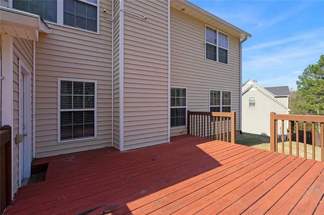 a balcony view with a seating space