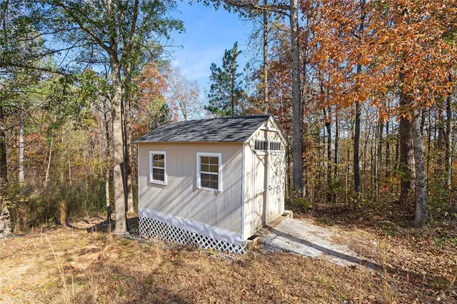 a house with trees in front of it