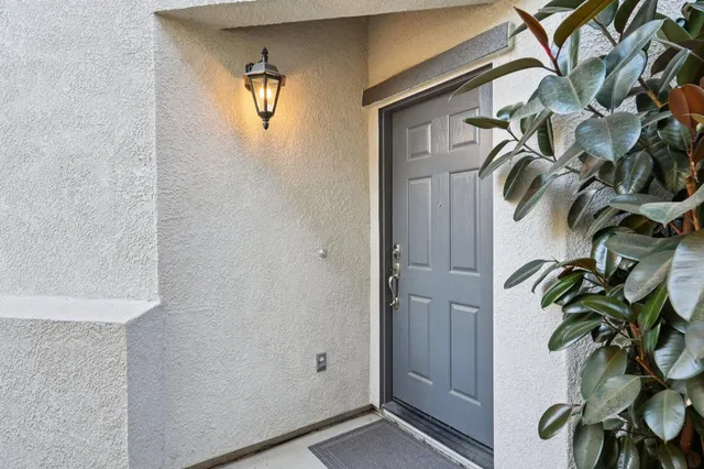 a view of a door and a window