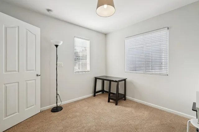 a view of an empty room and window