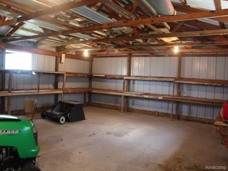 5506 Dixon Road Vassar, MI 48768 - Photo 11 of 11 5506 inside of pole barn with lots of room for storage or tool shop.jpg
